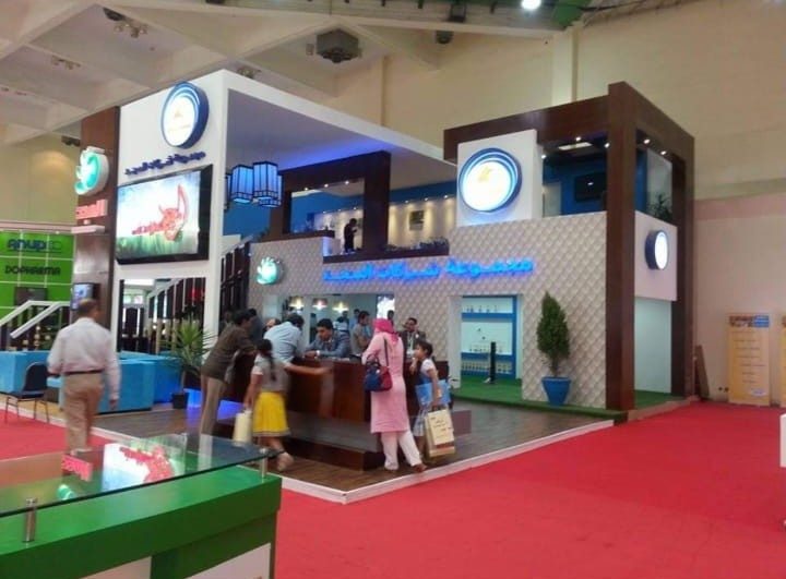 Island exhibition stand with reception counters built by The Task